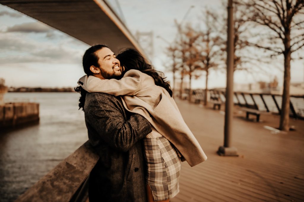 winter engagement session at sunset on Race Steet Pier in Philadelphia, PA by Brey Photo LLC 