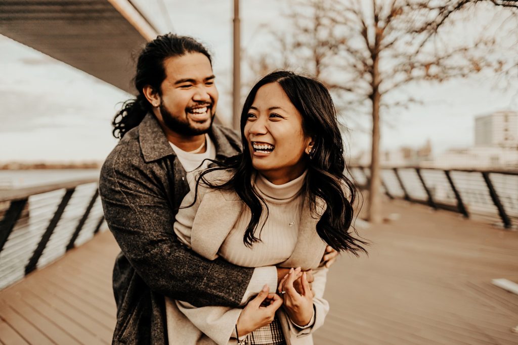 winter engagement session at sunset on Race Steet Pier in Philadelphia, PA by Brey Photo LLC