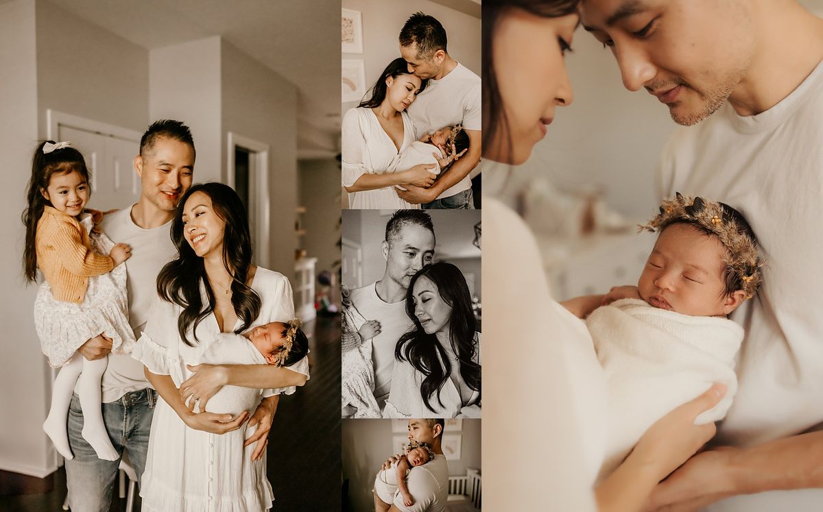 Mother holds newborn baby girl in neutral wrap surrounded by family during newborn photography session in Fishtown Philadelphia Pennsylvania